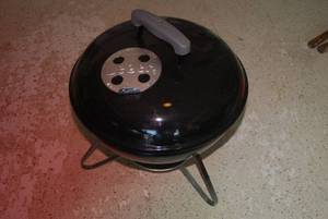 Super clean like new Weber charcoal...