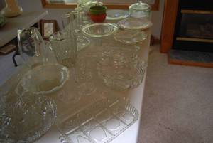 Table full of glass and serving war...