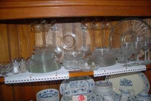 Lot of clear and cut glass serving ...