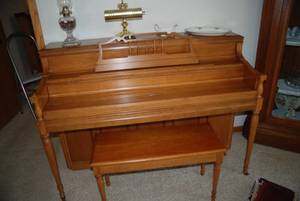 Lowery piano with bench. Nice condi...