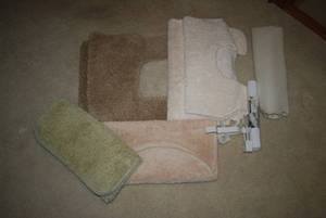 Lot of rugs and shelf liner...