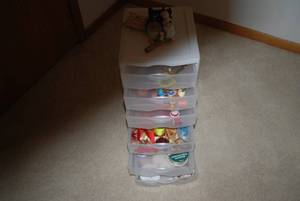 Plastic organizer with thread trim ...
