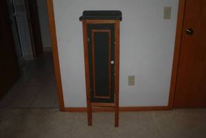 Tall wood cabinet 14 wide 44 tall...