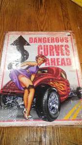 Dangerous Curves Ahead, Metal Sign.