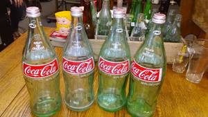 Coca Cola Coke 32 oz. Bottles with caps (4)