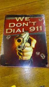 We Don�t Dial 911 Metal Sign