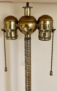 lot 124 image: Vintage Cupid Figural Double Socket Brass Table Table with Footed Base