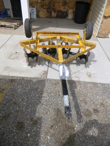 lot 29 image: Flip Over ATV Disc with Weight Bracket