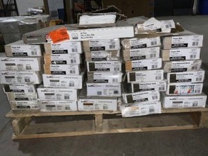 (34) Cases of Various Types of Traffic Master Peel & Stick Vinyl Flooring. Various Conditions. See Pictures