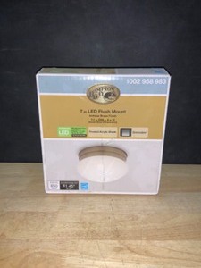 Hampton Bay 12-Watt Antique Brass Integrated LED Ceiling Flush Mount. See Pictures