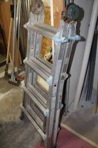 lot 15 image: Aluminum StepExtension Ladder