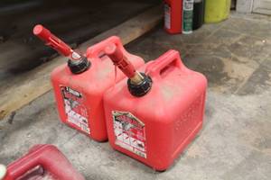 lot 70 image: Lot of (2) 2-Gallon Plastic Gas Cans