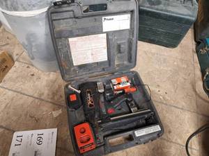lot 169 image: Paslode IM250 Cordless Solid State Finish Nailer with Battery, Charger, 16GA Finish Nails, Plastic Case
