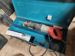 lot 170 image: Milwaukee Reciprocating Saw with Makita Metal Case