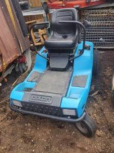 lot 12 image: Dixon Zero Turn lawn mower deck needs a couple new spindles