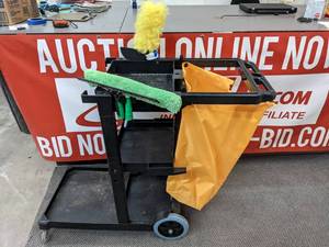 lot 83 image: Simple Magic Janitor Cart with 3 Shelves and Yellow Vinyl Bag - X