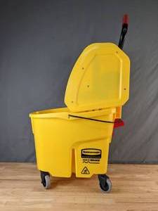 lot 78 image: New Rubbermaid WaveBrake Mop Bucket with Down Press Wringer, Yellow - X