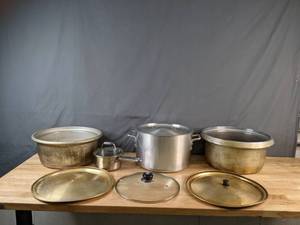 lot 179 image: Set of (4) Cookware Pots with Lids T-Fal , Winco and More - X