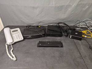 lot 187 image: Assortment of Electronics Vtech Phone, Arris Modem, Prophecy HDR Splitter, Cradlepoint Extender and More - X