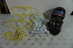 lot 91 image: Assorted Sporting Goods - Basketball Rebounder, Helmets, Golf Balls