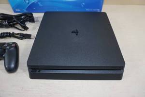 lot 25 image: Sony PlayStation 4 1 TB Slim Video Game System