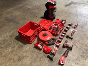 Assorted Milwaukee Tools - Drills - Tape Measures - Storage box etc. customer returns various conditions  review all pictures