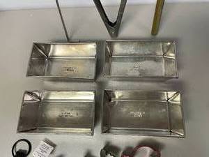 lot 44 image: Lot of Mini Loaf Pans, Cookie Cutters and More