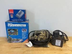 lot 7 image: Lot of Outdoor Pond Pumps and Lights