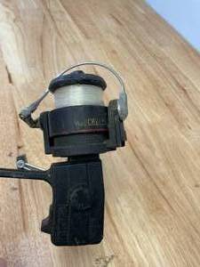 lot 22 image: Lot of 2 Long Fishing Rods & 1 Reel