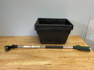 lot 64 image: 2 Planters and Garden Hose Extension