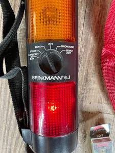 lot 32 image: Fishing Net Bag w Lure and Brinkmann 6 in 1 Light 