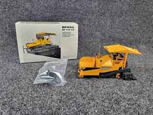 lot 109 image: NZG DEMAG DF 140 CS Road Finisher 150 Scale Diecast Model