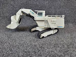 lot 125 image: NZG  DEMAG H185 Hydraulic Excavator 150 Diecast Model - Made in West Germany