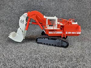 lot 126 image: Conrad O&K Tri-Power RH120C Hydraulic Excavator 150 Scale Diecast Model