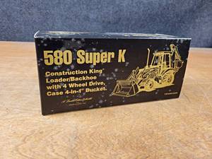 lot 150 image: Conrad 150th Anniversary Edition Case 580 Super K Backhoe Loader 135 Scale Diecast Model - Special Edition - Made in Germany - #3564 of 5000