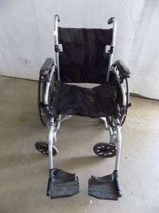 lot 40 image: Merits Wheel Chair