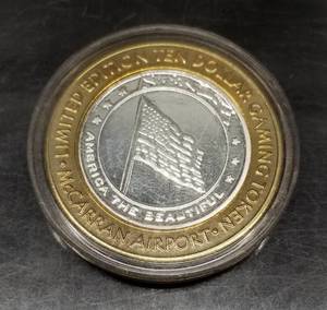 lot 05 image: .6 TROY OZ .999 FINE SILVER CASINO TOKEN WITH BRASS RING