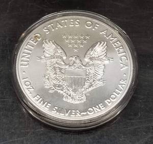 lot 21 image: 2020 AMERICAN SILVER EAGLE 1 TROY OZ .999 FINE SILVER IN AIRTITE