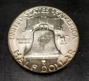 lot 24 image: 1957 FRANKLIN HALF DOLLAR GEM BU