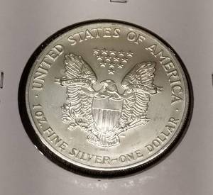 lot 28 image: 1992 AMERICAN SILVER EAGLE 1 TROY OZ .999 FINE SILVER DOLLAR
