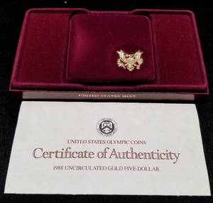 lot 47 image: 1988 US OLYMPIC $5 GOLD IN ORIGINAL PACKAGING .24 TROY OZ PURE GOLD