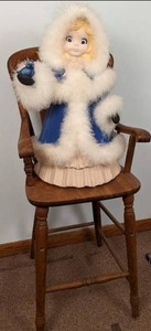 lot 62 image: Ceramic Doll and Chair