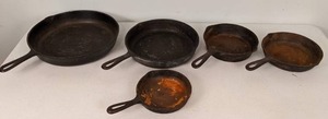 lot 64 image: Five Cast Iron Pans