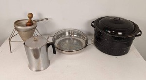 lot 59 image: A Set of Four Unique Cookware Pieces