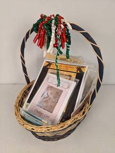 lot 80 image: Assortment of Vintage Quilting Patterns in a Woven Basket