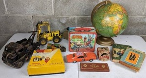 lot 32 image: Collection of Vintage Toys and Books Slinky, Dukes of Hazard Lunchbox, World Globe, Kodak Brownie Starlet Camera, Trucks, and More