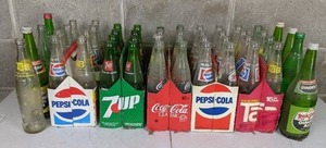 lot 17 image: Collection of Assorted Vintage Soda Bottles Coca-Cola, Pepsi-Cola, 7 Up, TAB and More
