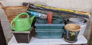 lot 23 image: Assorted Garden Items Planters, Hummingbird Feeder, Fencing, Weed Blocker, and More