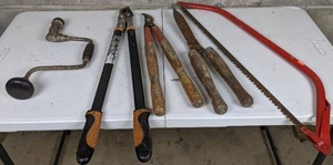 lot 26 image: Various Lawn Tools Vintage Hand Drill, Hedge Clippers, Hand Saw and More.
