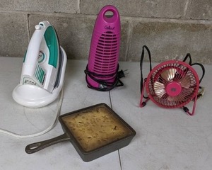 lot 116 image: 4-Piece Mixed Lot Includes 2 Fans, Oreck Iron and Brownie Pan Candle